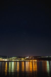 Starry sky at night over the marina, Izola, Slovenia