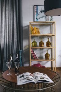 Stylish home decor with a wooden round table and a bookcase