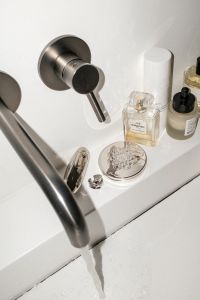 Kaboompics - Clean Aesthetics: Serene Bathroom Ambiance with Luxury Skincare Products