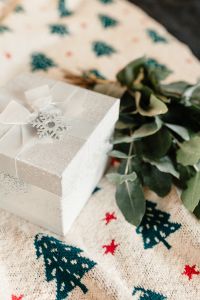 White decorative gift box on a blanket