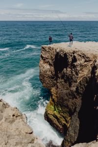 Kaboompics - Fishermen with a fishing pole, Cliff on the Western Seaboard of Algarve, Praia da Amoreira, Portugal