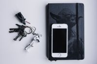 iPhone, Moleskin notebook, keys, Stormtrooper