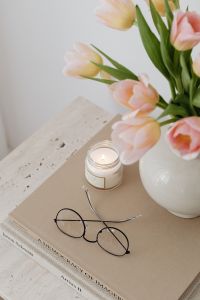 Kaboompics - Tulip flowers - candle - book - glasses