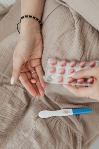 Kaboompics - Pregnant Woman Taking Vitamin Pills - positive pregnancy test