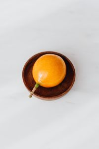 Kaboompics - Passion fruit on the white table