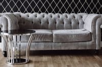 Elegant grey sofa and a table