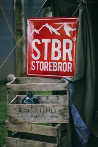 Red sign and wooden crates in a garden