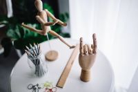 Wooden hand doing gesture