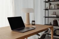 Kaboompics - Wooden table - laptop - candle - shelves - travertine lamp