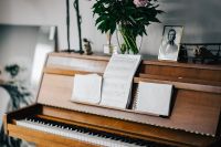 Old piano with sheet music