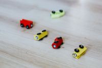 Wooden car toys on the floor
