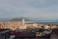 Kaboompics - Panorama of the city Naples and the volcano Vesuvius. Old houses at sunset
