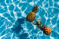 Pineapple in a swimming pool