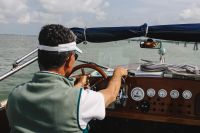 Man driving motor boat