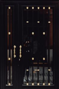 Kaboompics - Beautiful golden handle on the black door
