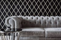 Elegant grey sofa and a table