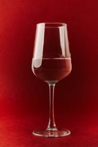 Kaboompics - Sophisticated Glassware Series with Bold Red Backdrop