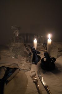 Kaboompics - Elegant Candlelit Table: Crystal Glassware - Satin Bows & Glowing Candles