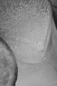 Glass with water - ice cubes - closeup - close-up - close up