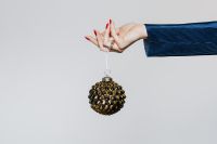 Hands holding bauble