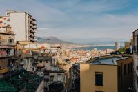 Panorama of the city Naples. Old houses at sunset