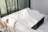 Kaboompics - Snowy Oasis - Calm and Cozy Winter Scenes - Snow-Covered Patio and Bamboo
