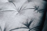 Kaboompics - Close-up of a grey sofa
