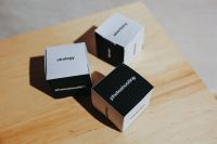Little paper boxes with words on them
