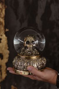 Kaboompics - A skull snow globe