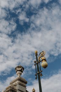 Gold lamp & Decorative fence of the Royal Palace in Madrid, Spain