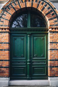 Kaboompics - GReen Front Door on a Brick Building