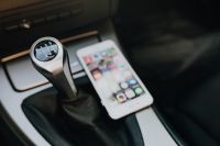 Kaboompics - Modern car interior with smart phone on manual gear stick