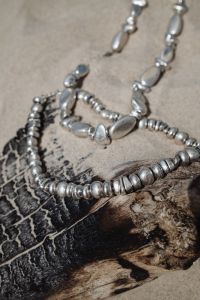 Kaboompics - Beachside Beauty: Close-Up of Metal Necklace