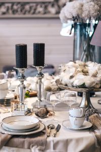 Kaboompics - Fancy restaurant dinner table decorated with quail eggs and feathers