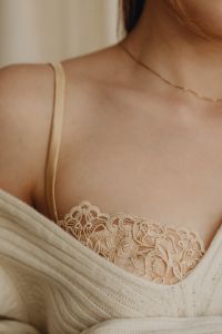 Satin bra with decorative lace trim