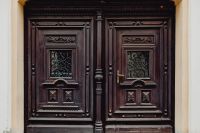 Photos from a walk around Zamość, Poland. Antique wooden doors.