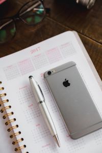 Calendar, pen, mobile phone