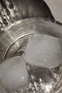 Glass with water - ice cubes - closeup - close-up - close up