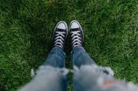 Kaboompics - Woman, jeans, sneakers, green grass