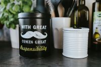 Kaboompics - Kitchen utensils and cans by the wall