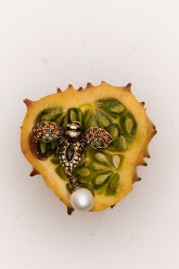 Kaboompics - Vintage-Inspired Brooch on Kiwano – Unique Jewelry Showcase