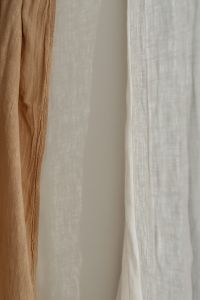 Kaboompics - Wrinkled curtain in beige or brown color