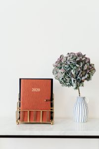 Kaboompics - Planner on The White Marble Table, White Background, HYDRANGEA