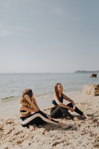 Kaboompics - Women sitting on the beach