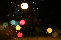 Kaboompics - Colourful city lights through a wet car window
