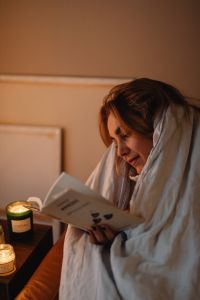 Kaboompics - A woman reads a book - reading