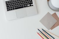 Kaboompics - Laptop and pencils on desk - envelopes - copy space