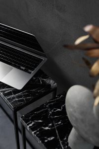 Kaboompics - Macbook Pro laptop - marble - decorative plaster on wall - black aesthetics