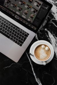 Kaboompics - Coffee & Laptop on Marble Table – Home Office Workspace Background