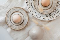 Kaboompics - Beige Easter table setting - quail eggs - neutral colors - natural eggs